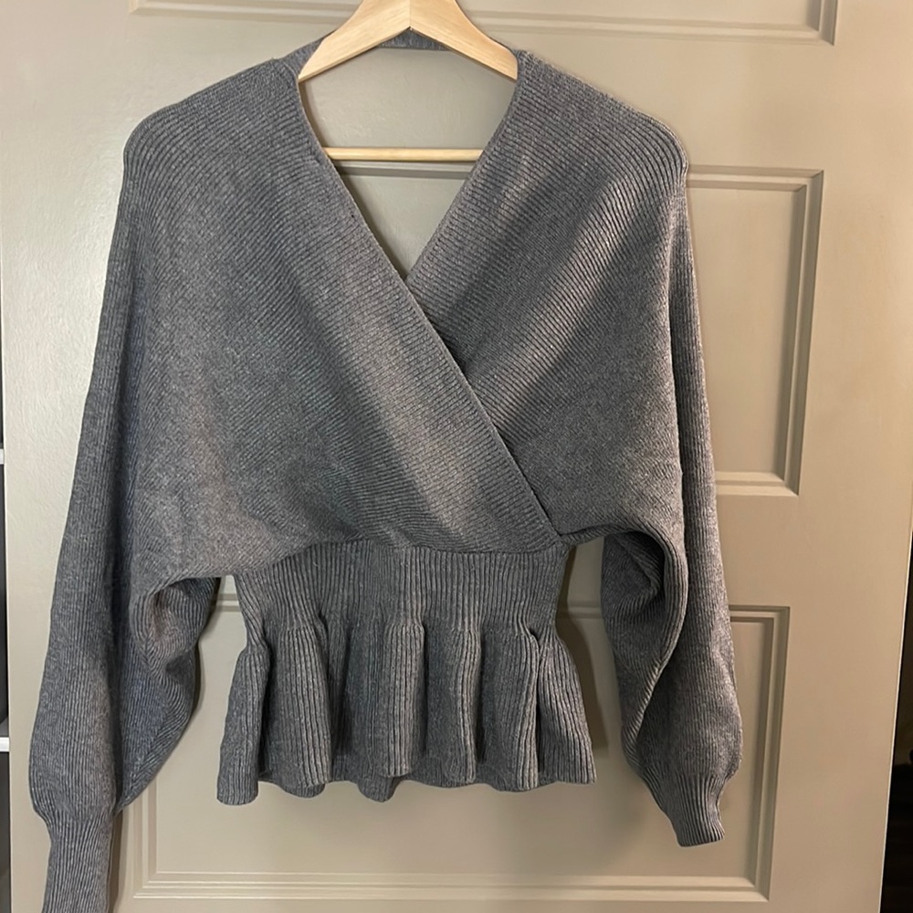 Peplum sweater top